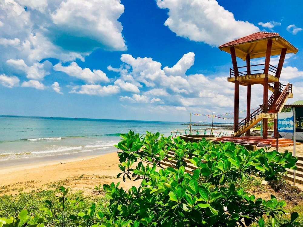 The beach’s pristine stretch is perfect for leisurely walks and peaceful seaside moments